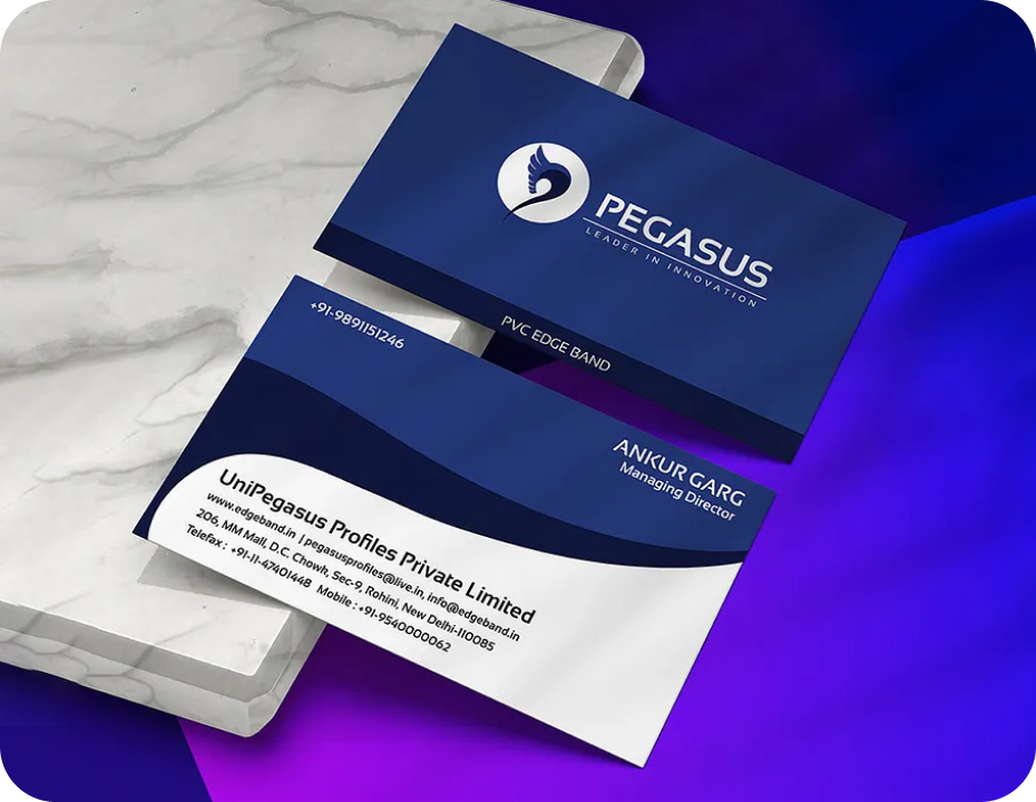 Pegasus branded business cards with blue and white design on marble and purple background.